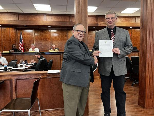 Mayor David Miller presented Leeds High School Band Director, Chip Wise, with a City of Leeds Proclamation of Recognition this week at the Council Meeting in congratulations to Wise and entire LHS Band for their outstanding performance.  Wise spoke a few words after the presentation including information about their Spring Band Concert scheduled for May 4.